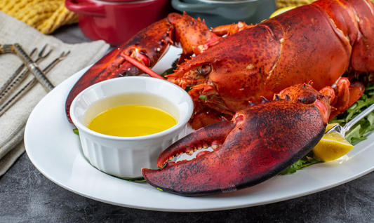 Indulge in Elegance: Garlic Herb Butter Cooked Boston Lobsters